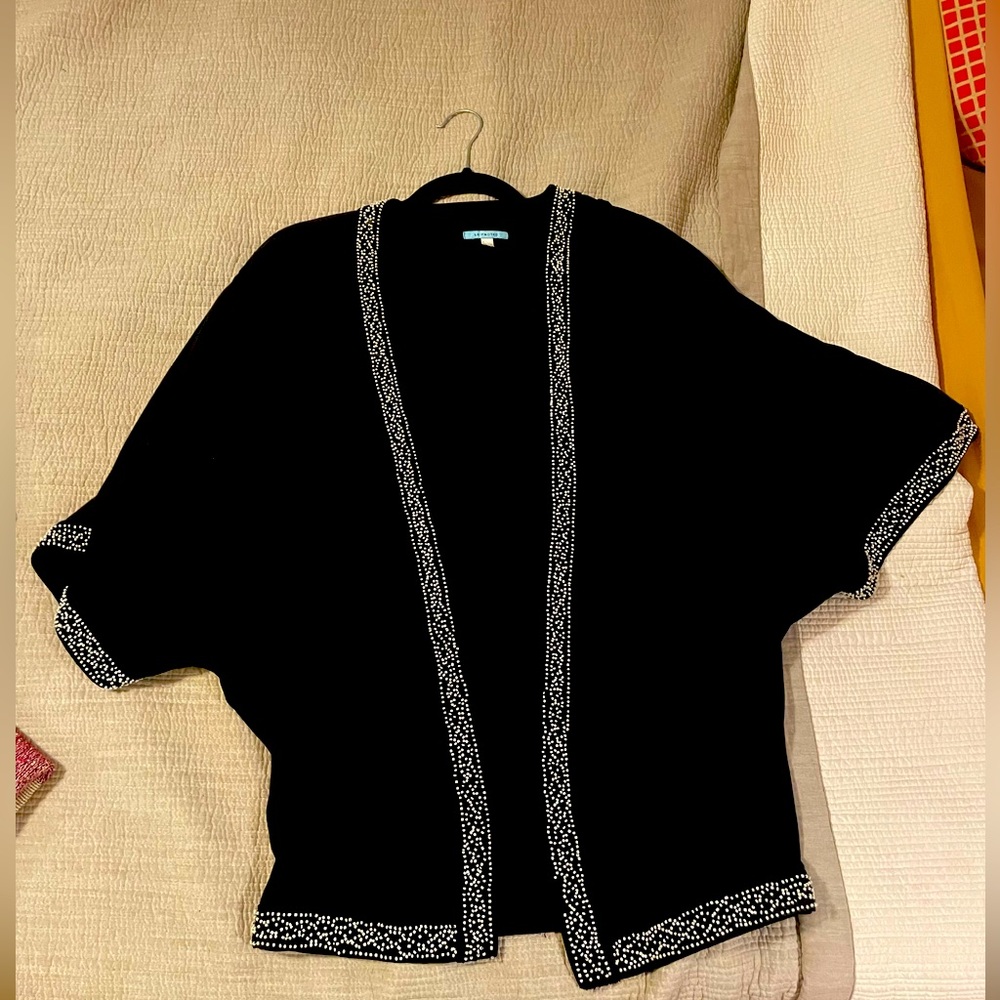Incredible hand beaded light sweater. Very sophisticated and comfortable. 💎